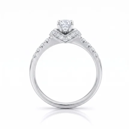 Diamond engagement ring with a pavé-diamond band and a prominent central diamond in a four-prong setting (white metal)