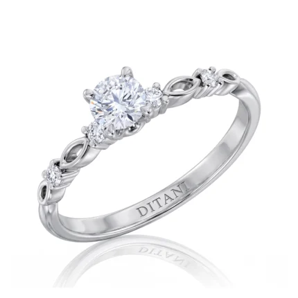 Silver ring with a large central diamond and smaller side stones along a twisted, braided band; inside engraving reads DITANI.