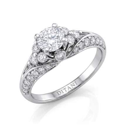 White gold engagement ring with a large round center diamond surrounded by smaller diamonds, pavé-set band, and 'DITANI' engraved inside
