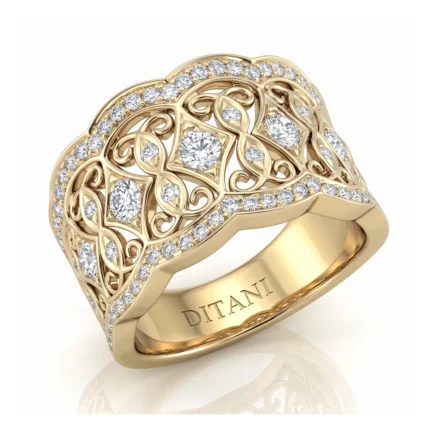 Ornate gold ring with intricate scrollwork and diamond accents along the edges