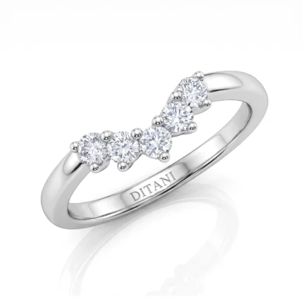 Silver ring with five round-cut diamonds set in a diagonal line along the band, prong settings, and 'DITANI' engraved on the inner band