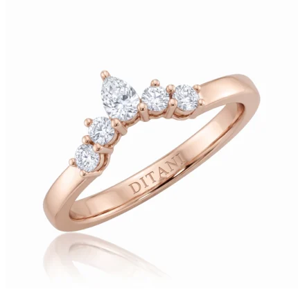 Rose gold ring with five diamonds arranged in a curved row on top, inner band engraved DITANI.