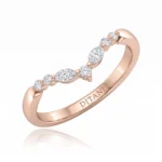 Rose gold ring with a curved diamond row and 'DITANI' engraved on the inner band.