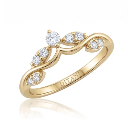 Gold ring with a wavy band set with several small diamonds, brand name DITANIT engraved inside the band