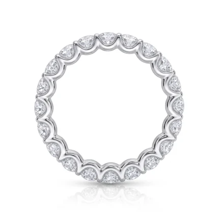 Silver eternity ring with pear-cut diamonds encircling the band, set in a wavy bezel.” ,