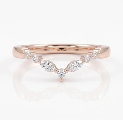 Rose gold ring with a V-shaped row of diamonds, featuring a central round diamond centerpiece.