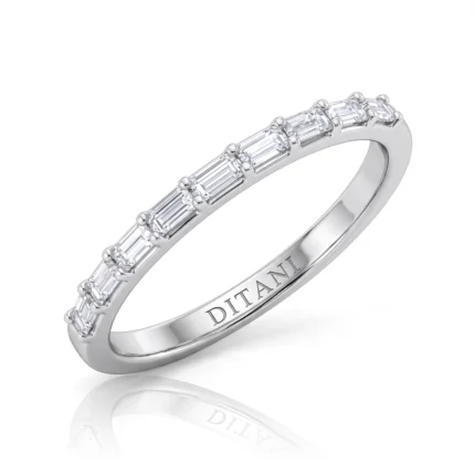 Silver ring with a row of rectangular baguette-cut diamonds along the band and 'DITANI' engraved on the inner side.