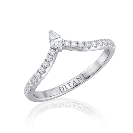 Diamond engagement ring with a marquise-cut center stone and pavé diamonds along the band (DITANI inside).