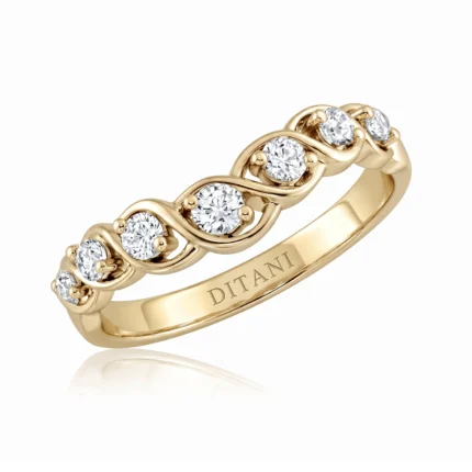 Gold ring with five round diamonds set in curved, linked bezels and DITANI engraved on the inner band.