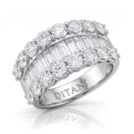 Silver ring with two rows of round diamonds and a row of baguette diamonds, engraved DITANI on the inner band.