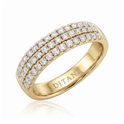 Gold ring with three parallel rows of diamonds in a pavé design on top, inner engraving says DITANI