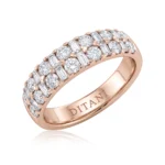 Rose gold multi-row diamond ring with prong-set stones and engraved inner band reading DITANI