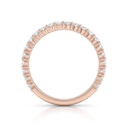 Rose gold eternity ring with diamonds encrusted around the entire band, on a white background, close-up view