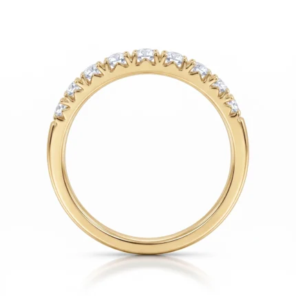 Gold ring with a row of diamonds along the top edge for an elegant, classic look.