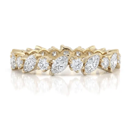 Gold bracelet with alternating marquise-cut diamonds set in leaf-shaped links.