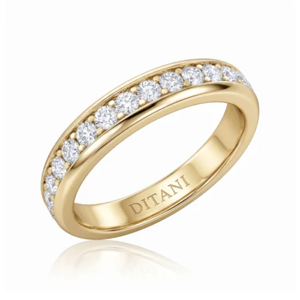 Gold ring with a row of diamonds along the top edge and 'DITANI' engraved on the inner band.