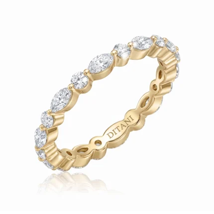 Gold ring with alternating diamond ovals and rounds set in a shared prong setting, brand: Ditani (engravings visible)