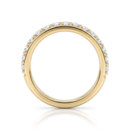 Gold ring with a full circle of diamonds set along the outer edge of a yellow-gold band