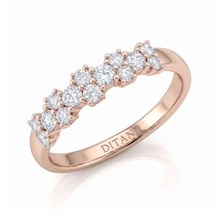Rose gold ring with a row of round diamonds set along the top, engraved 'DITANI' on the band