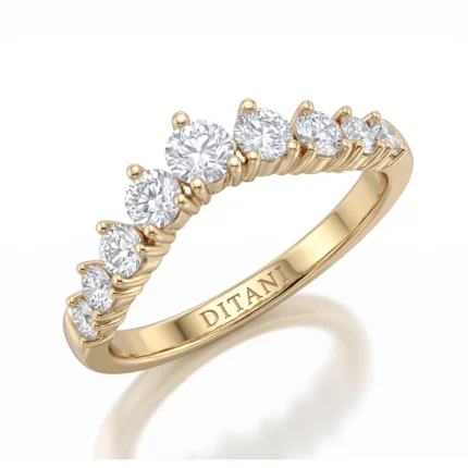 Gold ring with a row of seven prong-set diamonds, engraving 'DITANI' on the band.