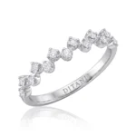 Silver ring with alternating diamonds along a slim, polished band and 'DITANI' engraved inside