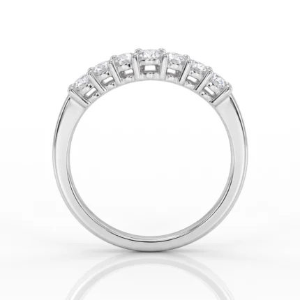 Platinum ring with a curved row of square-cut diamonds along the top.