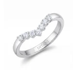 Silver ring with six round-cut diamonds set along the top in prong settings, inner band engraved with DITANI.