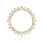 Gold-tone eternity ring with alternating round diamonds and gold teardrop accents.