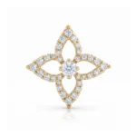 Gold pendant in a four-lobed fleur-de-lis design encrusted with diamonds against a white background.