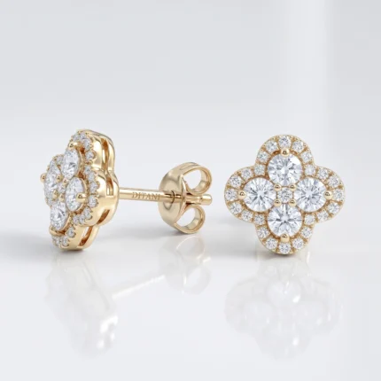 Gold stud earrings in a four-leaf clover shape set with diamonds, front view.
