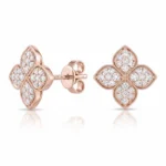 Rose gold stud earrings with a four-leaf clover motif, pavé-set diamonds, and screw-back posts.