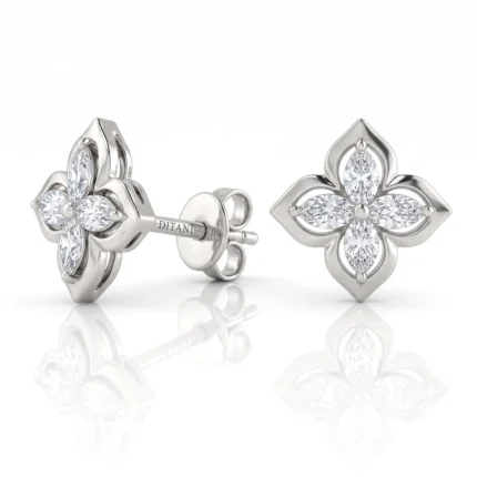 Silver flower-shaped stud earrings with a four-petal clover design, set with clear stones; shown from side and front with posts visible on back side.
