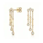 Gold-tone drop earrings with multiple delicate chains, round diamond accents, and a screw-back closure.
