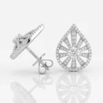 Teardrop-shaped diamond drop earrings set in white metal with pavé diamonds around the edge.