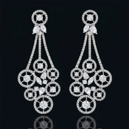 Pair of diamond chandelier earrings with circular halo motifs and dangling pavé-set stones, on a dark background for contrast.