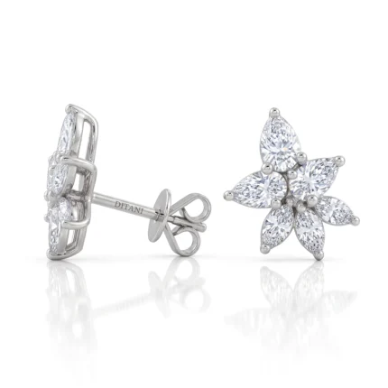 Diamond-studded silver butterfly/flower earring with five petal-shaped diamond petals arranged around a center, shown from side and front with butterfly backings