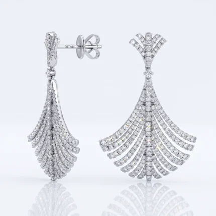 Diamond chandelier earrings with a fan-shaped cascade of pavé-set diamonds, silver metal.