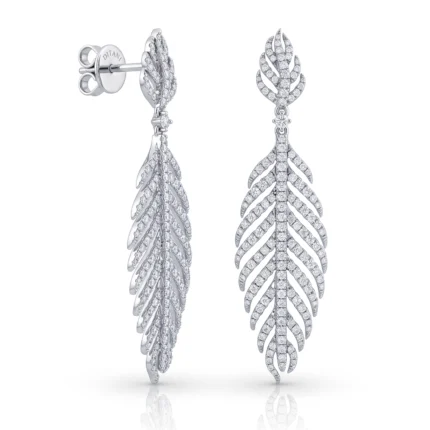 Diamond-leaf drop earrings in silver with pavé diamonds, shown from side and front. Elegant, fern-inspired dangle jewelry.