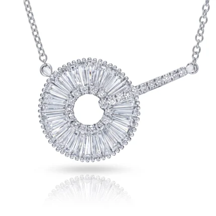 Diamond halo pendant: a circular ring of baguette-cut diamonds around a hollow center, with a diamond-studded bar extending to the right on a silver chain.