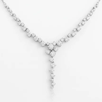 Elegant diamond necklace with a Y-shaped drop, featuring round-cut diamonds and a cascading pendant.