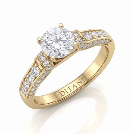 Gold engagement ring with a large central diamond held by four prongs, plus pavé diamonds along the shank and the word 'DITANI' engraved inside the band.