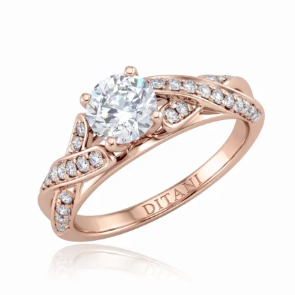 Rose gold ring with a large round center diamond, split shank pavé diamonds, and the word 'DITANI' engraved inside the band.
