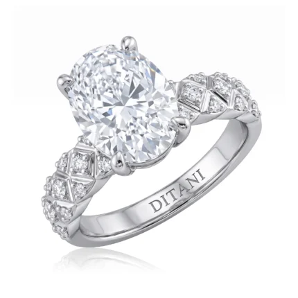 Diamond engagement ring featuring a large oval center stone with a diamond-studded band; 'DITANI' engraved inside the band.