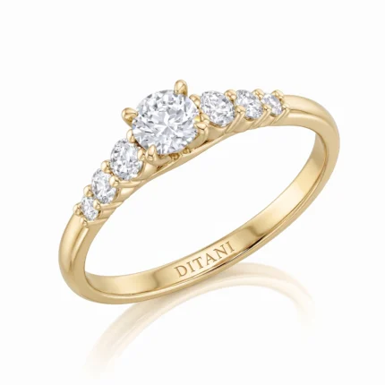 Gold ring with a row of diamonds along the band, featuring a central large diamond and smaller stones, engraved 'DITANI' on the inner band.