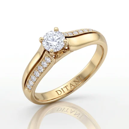 Gold engagement ring with a round center diamond and pavé-set diamonds along the band, inside engraving reads 'DITANI'