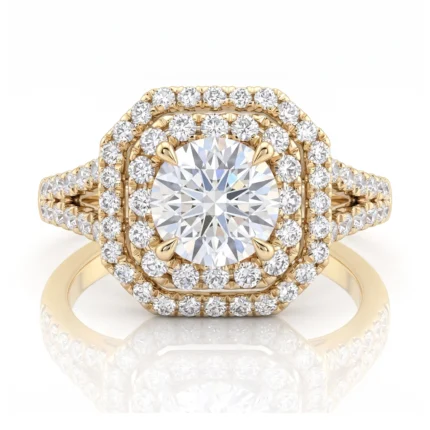 Gold halo engagement ring: large round center diamond surrounded by two rows of pavé diamonds on a diamond-studded gold band.