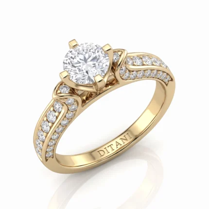 Gold ring with a large central round diamond in a four-prong setting and pavé diamonds along the band.