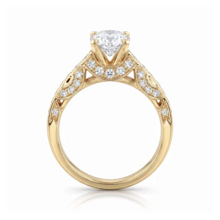 Gold engagement ring with a large central diamond and pavé-set diamonds along the ornate band on a white background.