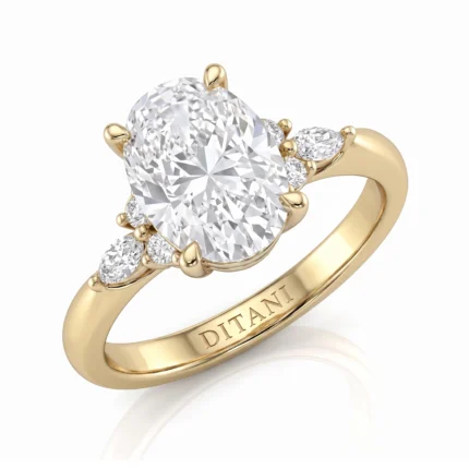 Gold engagement ring with a large oval diamond centerpiece and smaller diamonds along the band