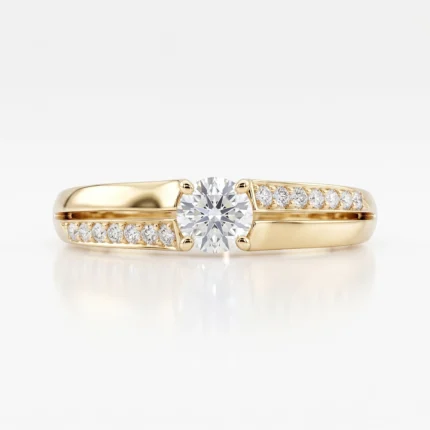 Gold ring with a round center diamond and pavé diamonds along the bands, set in yellow gold